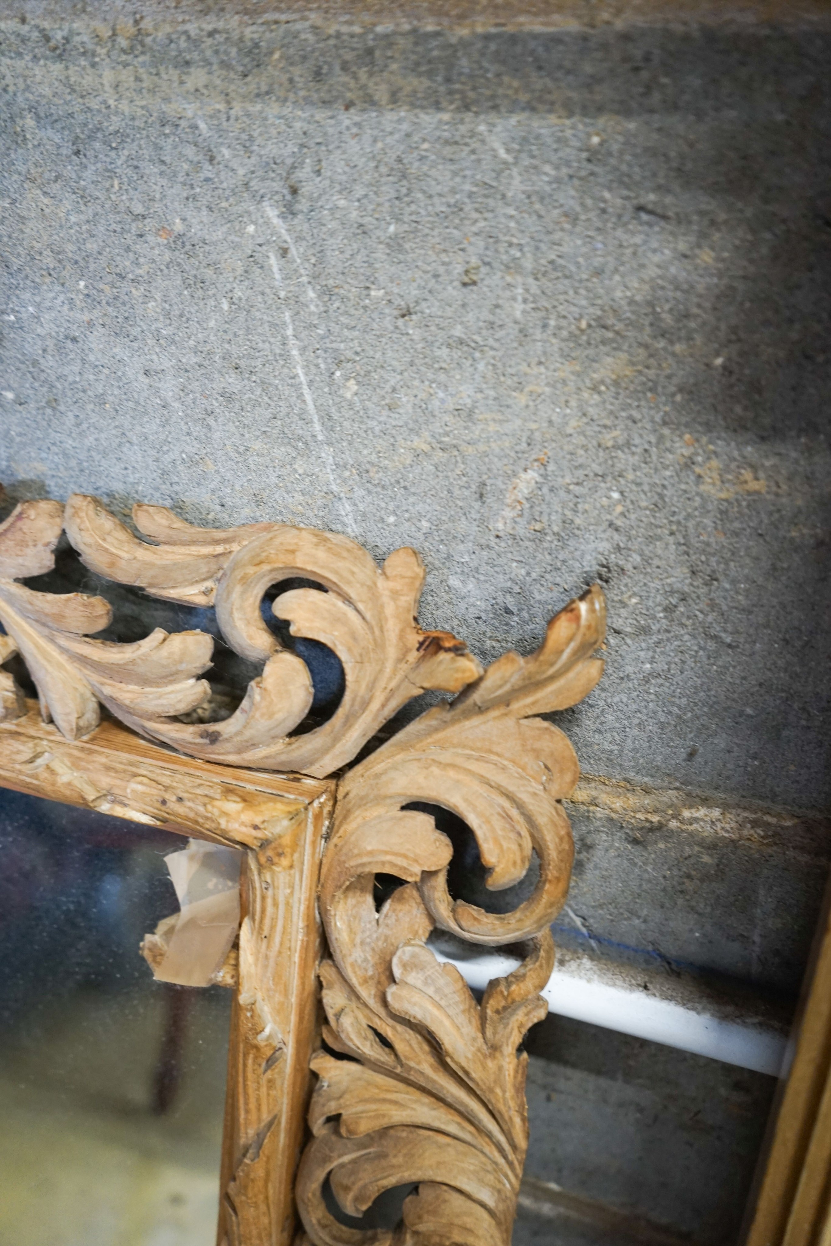 A carved oak framed rectangular wall mirror, width 65cm, height 82cm